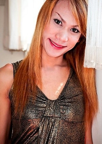 A hot little Lilly number who smiled throught the shoot. A real cutie and very horny