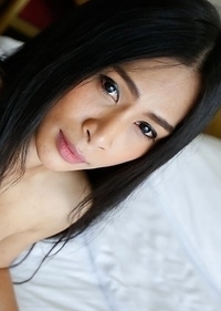 Sexy Thai ladyboy Pang  sucking big white cock