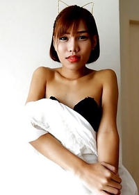 18 year old horny Thai shemale Natty striptease to black panties and hard cock