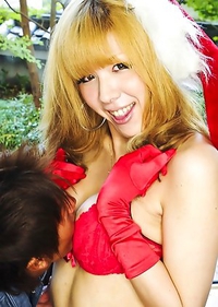 It's not quite Christmas yet, but I do have a tasty holiday treat for you to enjoy! Noa Iijima is dressed as a ho-ho-ho and her boy toy loves it!