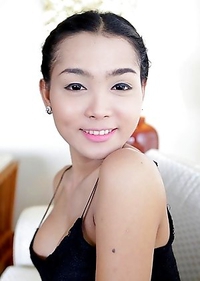 22 year old busty Thai ladyboy Samy gets naked and poses for tourist