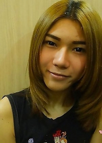 19 year old shy Thai ladyboy May gets naked and does a striptease